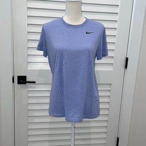 Purple Nike dri-fit athletic top with moisture wicking material. Size large
